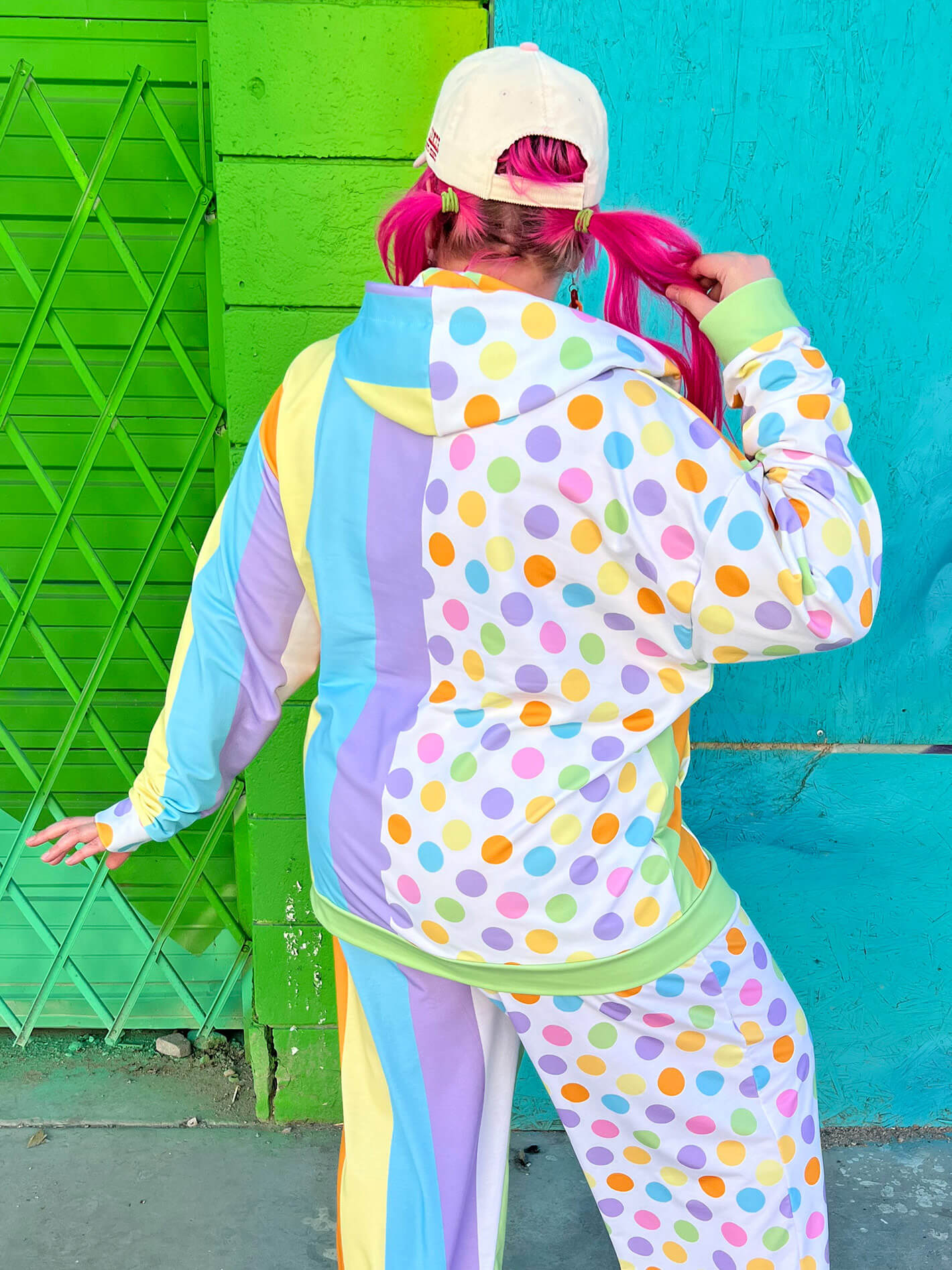 Pastel clown striped and polka dot hoodie.