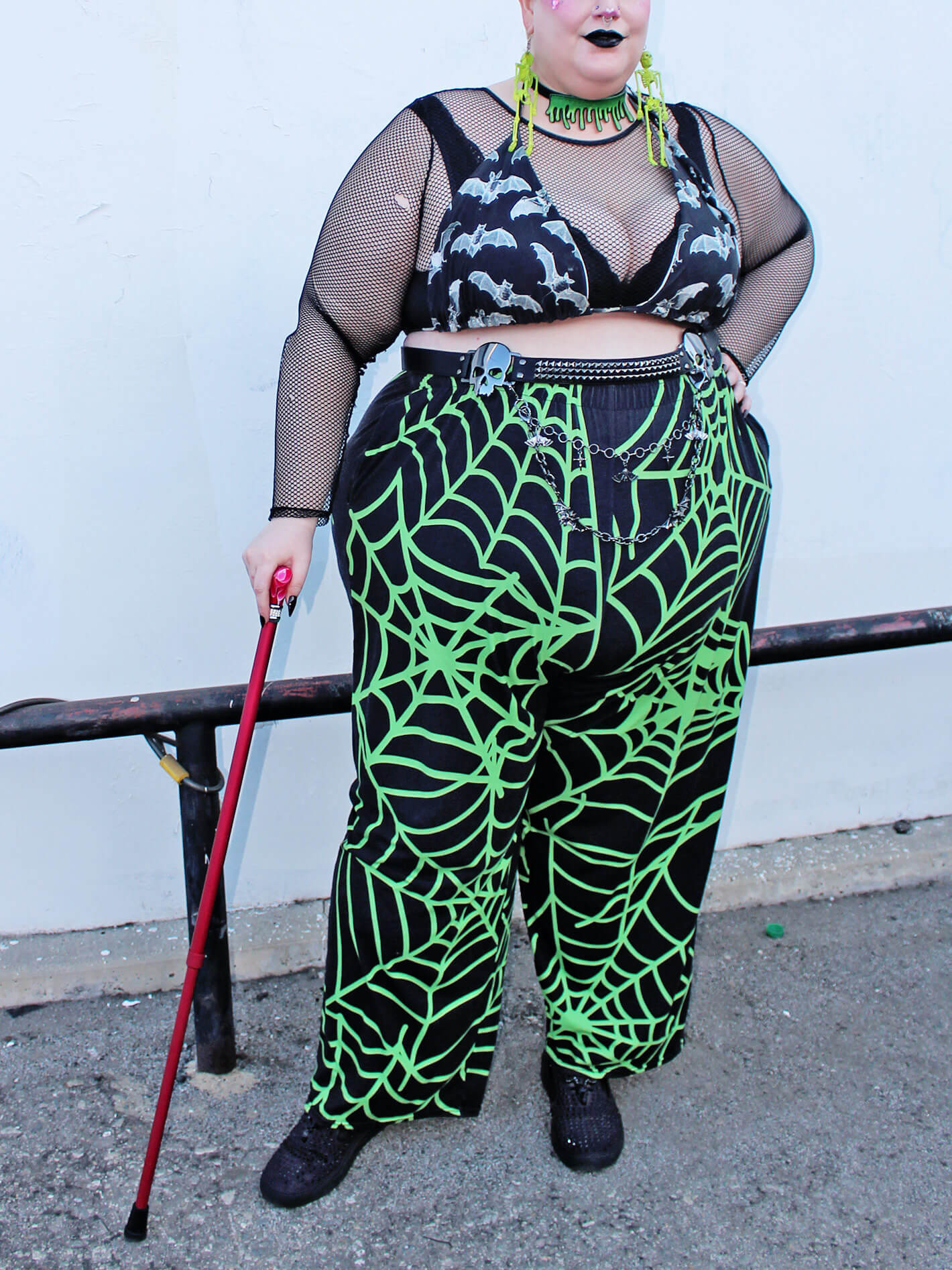 Plus size goth spiderweb pants.