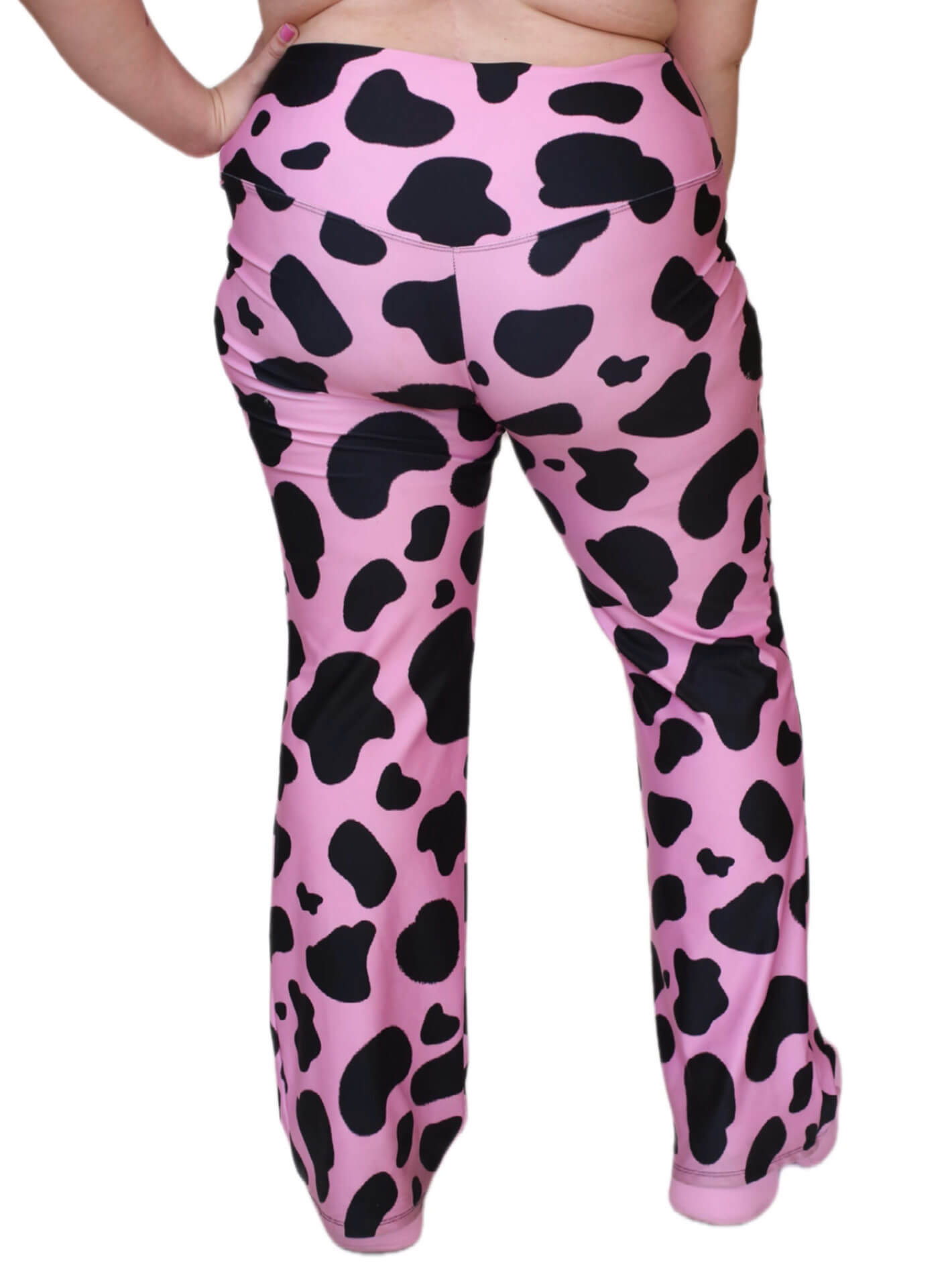Plus size pink cow print flares.