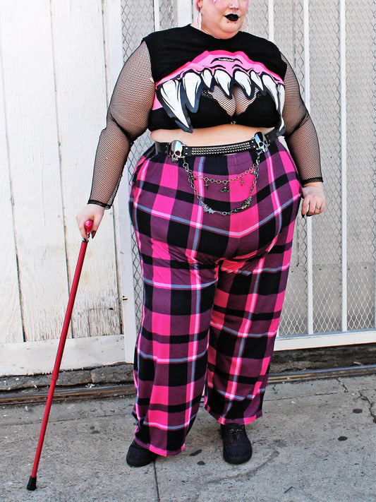 Punk pink and black plus size pants.