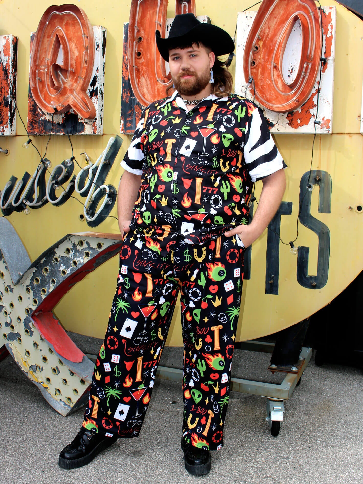 Kitschy queer plus size pants and shirt.