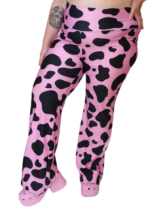 Pink plus size cow print pants.