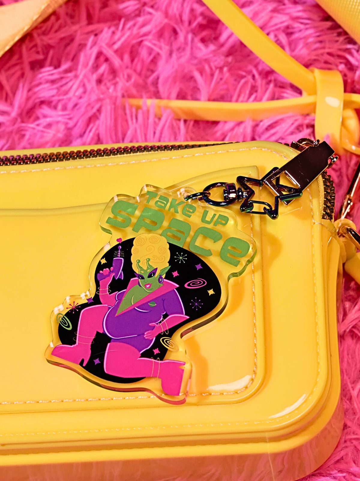 Take up space alien pinup keychain.