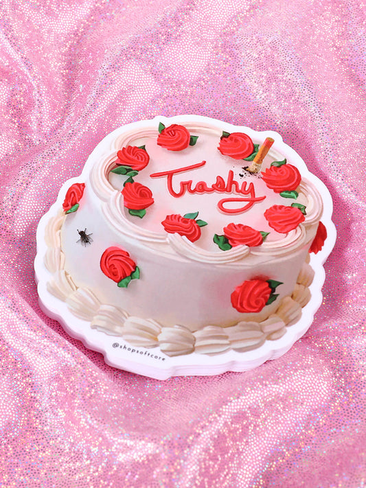 Trashy campy John Waters vintage cake sticker.