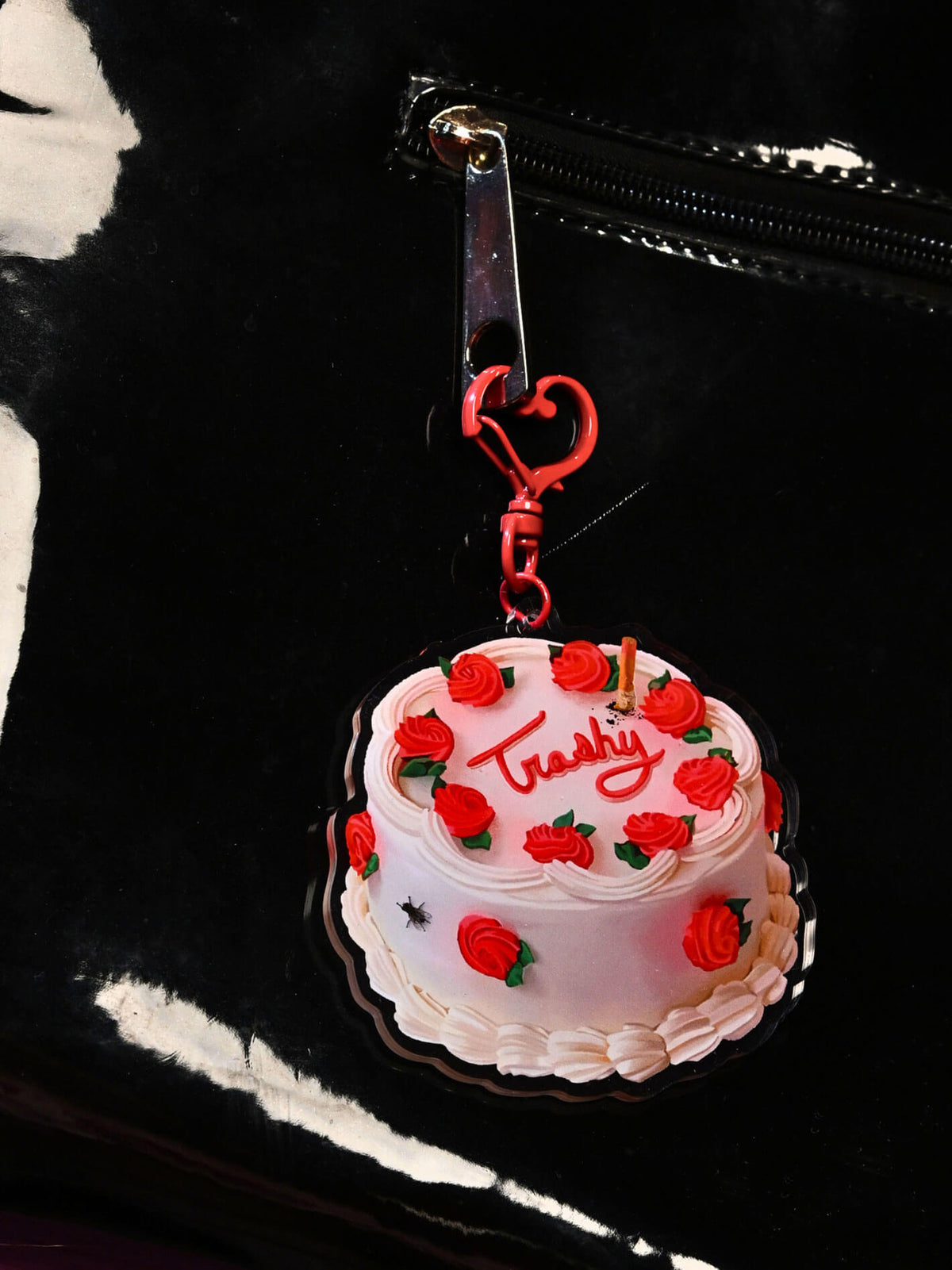 Trashy retro cake John Waters keychain.